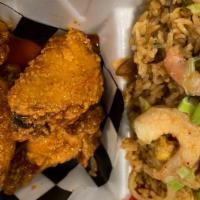 Garlic Fried Rice And Chicken Wings Special · 4 plain pressure-fried wings with a side of garlic fried rice. Make it tossed or add seasone...