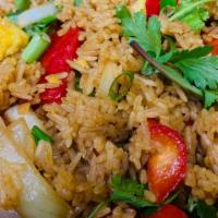 Famous Garlic Fried Rice  Pint Size · Garlic rice with sautéed onions, peppers, and fresh herbs. Add seasoned chicken or shrimp fo...