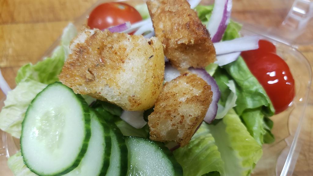 House Side Salad · Romaine lettuce, red onion, grape tomato, cucumber, cherry pepper and house-made croutons with a side of Italian dressing.
