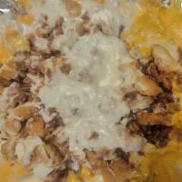 Chicken Bacon Ranch Fries · Chopped Fried Chicken And Bacon. Topped With Mozzarella, Nacho Cheese & Ranch Dressing.