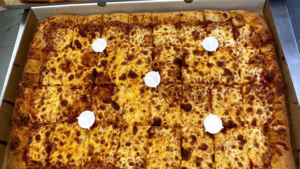 Sheet Cheese Pizza · 32 slice full sheet pizza , we use our own fresh dough 
Not frozen shells, our sheet pizzas are amazing!