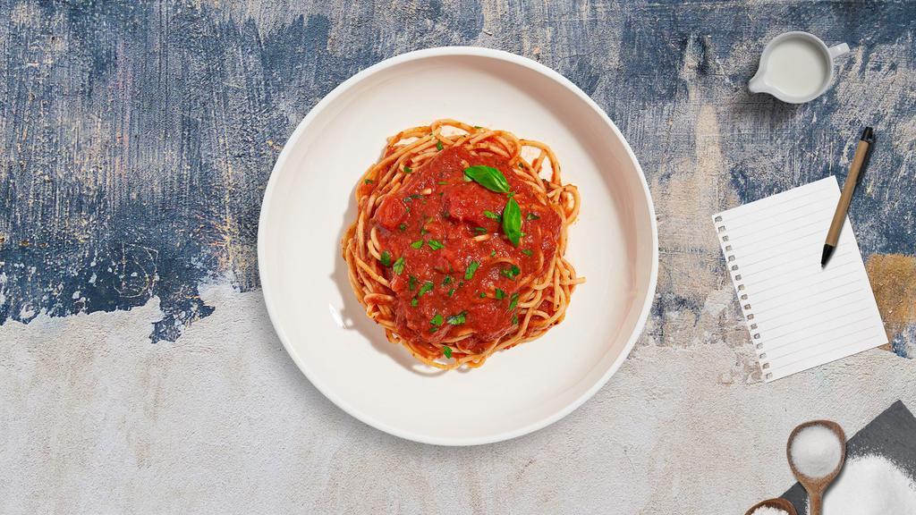Dreamy Pomodoro Spaghetti Pasta · Fresh spaghetti cooked with classic Italian tomato sauce and fresh basil.
