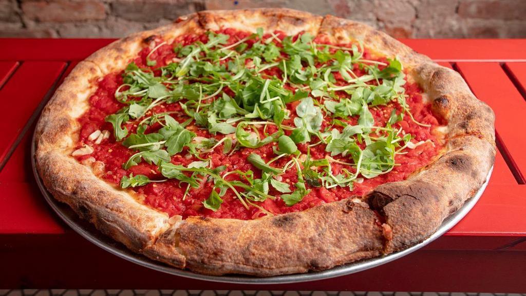 Vegan Marinara Pizza · Organic tomato sauce, basil, fresh chili flakes, and arugula. Does not contain cheese.