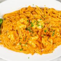 Γαριδομακαρονάδα / Shrimp Pasta · Shrimp with fresh tomato & brandy sauce over spaghetti.