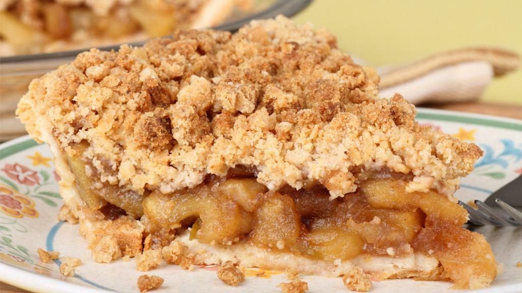 Apple Crumb Pie · Fresh baked apple pie expertly crafted with crisp locally grown apples in a buttery crust and topped with a sweet crumble.