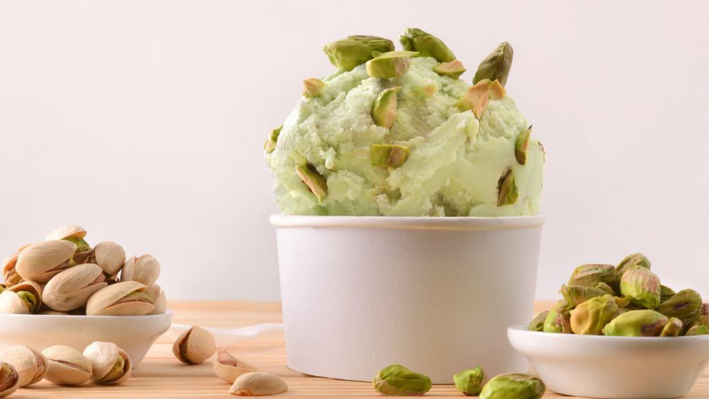 Pistachio Ice Cream Sundae · 2 scoops of delicious Haagen-Dazs pistachio ice cream along with chocolate syrup, whipped cream and nuts.