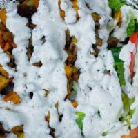 Mix Gyro Platter · Halal. Mix of chicken & gyro over rice. W/can soda for an additional charge.