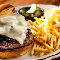 Beef & Mushroom Burger · Roasted mushrooms, caramelized onions, Gruyere, and arugula. Served with pickled cucumbers a...