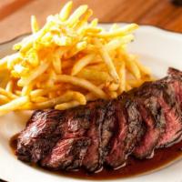 The Ribbon Steak · 8oz hanger steak, green peppercorn sauce and fries