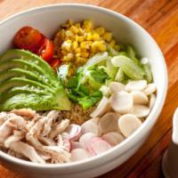 Quinoa Bowl Salad · Chicken, avocado, tomatoes, radishes, hearts of palm, corn and celery with green goddess dre...