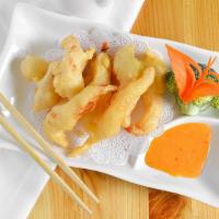 Rock Shrimp (10) · Crispy shrimp with sweet chili sauce.