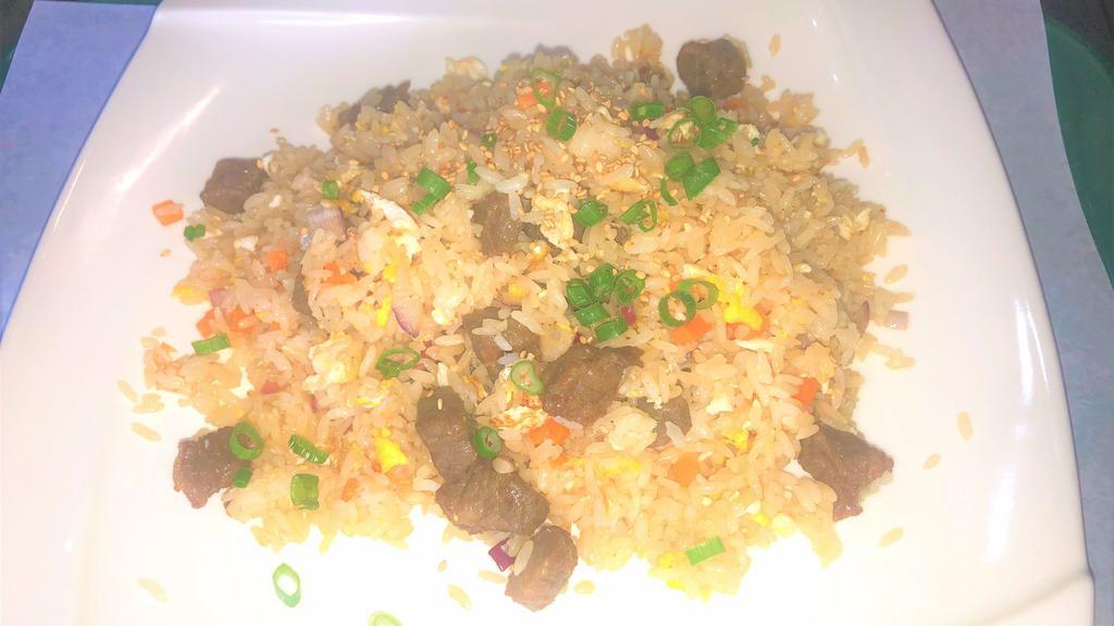 Beef Fried Rice · With onion, scallions, carrots, egg, sesame seed.