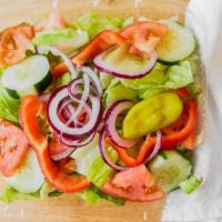 Garden Salad · Romaine lettuce, tomatoes, red onions, cucumbers, green peppers, pepperoncini and croutons. ...