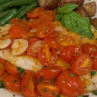 Sogliola Pomodorini · Egg-battered fillet of sole in a cherry tomato sauce. Served with veggies and roasted potato...
