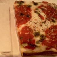 Grandma Pizza Slice · Most popular. Thin, square crust, A Fusion of  Fresh Mozzarella and Regular Mozzarella Chees...
