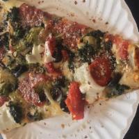 Veggie Pizza Slice · Most popular. Broccoli, Spinach, Olives, Onions, Mushrooms and Red Roasted Peppers.