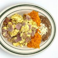 Huevos Con Jamon · Scrambled eggs with ham, served with rice and beans
