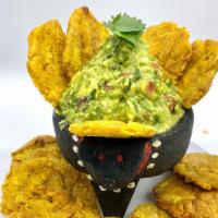 Guacamole & Tostones · mashed avocado with onion, cilantro, lime, tomato served with fried green plantain.