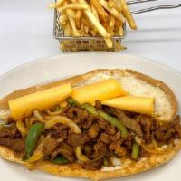 Philly Cheesesteak · Seasoned steak sauteed with onion, pepper and American cheese. Served with French fries.