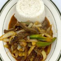 Steak Over Rice · Sauteed onion, bell pepper and mushroom.