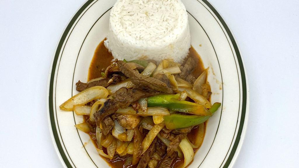 Steak Over Rice · Sauteed onion, bell pepper and mushroom.