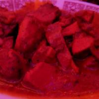 Chicken Tikka Masala · Boneless chicken cubes marinated in herbs and spices then barbecued over charcoal in the tan...