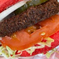 Falafel Burger · Chipotle mayo, lettuce, tomato, onion, & pickles