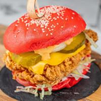 Crispy Chicken · Fried chicken, lettuce, tomato, onion, pickles, thousand island dressing, cheese.