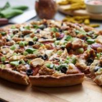 Vegenation Pizza · This pizza has our signature red sauce, fresh diced mozzarella cheese, fresh mushrooms, cris...