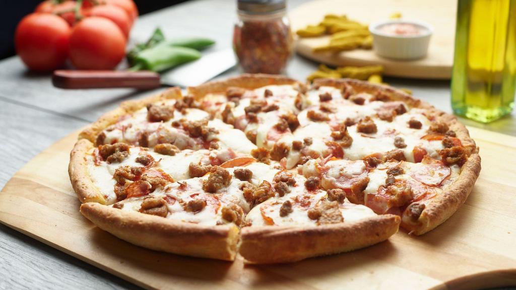 All Meat Pizza · This pizza has our signature red sauce, pepperoni, sliced  chicken, sliced  lamb.