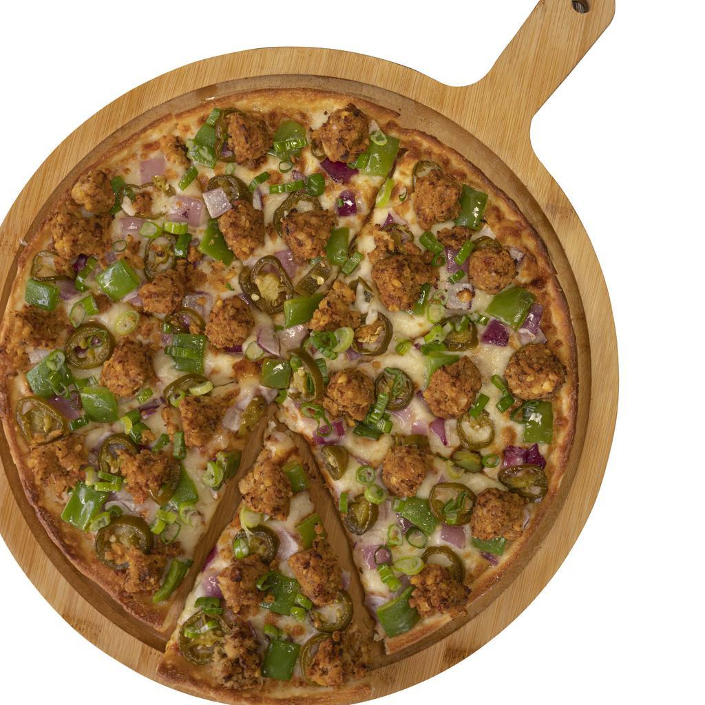 Manchurian Veggie Pizza Twist · This pizza has our signature Manchurian sauce, fresh diced mozzarella cheese, crisp red onions, fresh bell peppers, spicy jalapeño, fresh-cut; garlic, ginger & green chilies, garnished with fresh green onions.