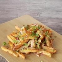Masala Fries Twist · Our masala fries twist has sliced red onions, fresh-cut; garlic, ginger & Green chillies, to...