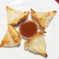 Samosa (2 Pc) · Our samosas are stuffed with potatoes, peas & spices.