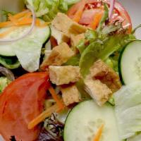 House Salad · Mixed salad, tomato, cucumber, carrot, and red onion w/ peanut dressing