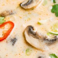 Tom Kha · Coconut lemongrass soup with mushroom, bell peppers, onion and parsley.