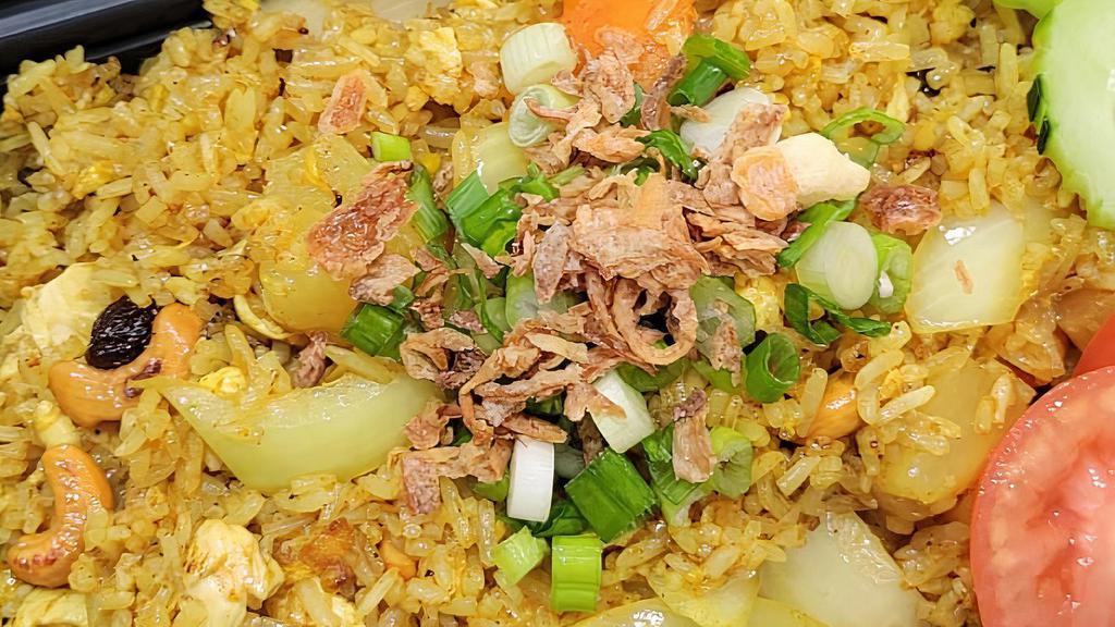 Pineapple Fried Rice · Fried rice with pineapple, cashew, onion, scallion & egg.