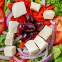 Romano'S Salad · Spring greens topped with cucumbers, tomatoes, fresh mozzarella, roasted peppers, onions and...