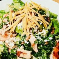Mexican Caesar Salad · Kale, Romaine Lettuce and avocado; tossed in a creamy Caesar dressing with pepitas, queso fr...
