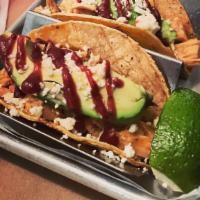 Turkey Tacos · Roasted Turkey, Vegetable Stuffing, Avocado, Picante Cranberry Sauce and Queso Fresco