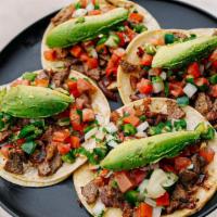 Mexican Tacos · Four Double Corn Tortilla Tacos with Choice of any Meat, Topped with Pico de Gallo and Avoca...
