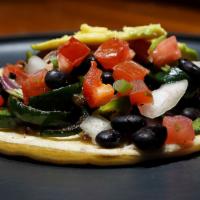 Un Veggie Taco · One Double Corn Tortilla Taco with Beans, Veggie Mix ( Grilled Onions and Peppers), Pico de ...