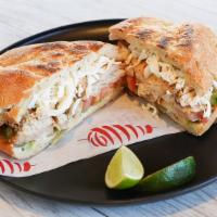 Torta De Pollo · A Mexican Style Sandwich with Mayo, Avocado, Tomato, Pickled Jalapenos, Chicken, and Mozzare...