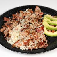 Quemevez · A Mix of Pork Chops, Ham, Bacon, and Melted Mozzarella on Top. With Side of Tortillas, Pico ...
