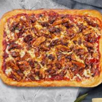 Buffed Up Buffalo Vegan Pizza · Vegan buffalo chicken topped on a vegan 14