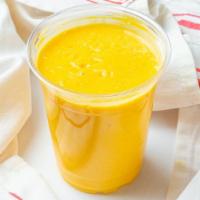 Mango Lassi · Yogurt drink with mango pulp.