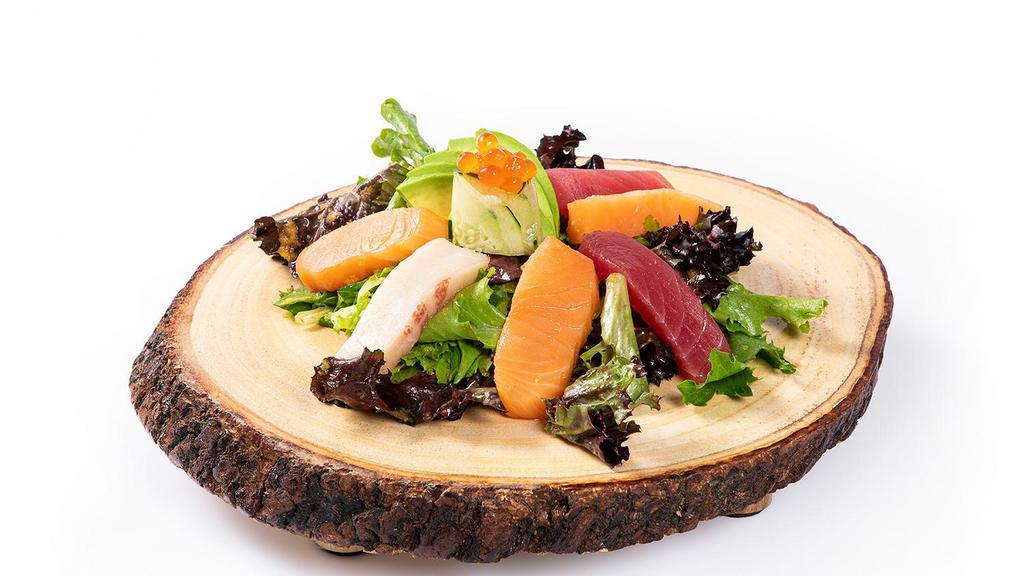 Sashimi Salad · Tuna, Salmon, Yellowtail, white Tuna with mixed green, avocado, ginger or sesame dressing