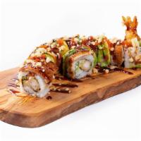 Kuro Dragon Roll · Tempura Shrimp, Cucumber, Topped with Eel, Avocado, Green Onion, Masago, Tempura Batter & Su...