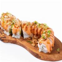 Ocean Roll · Imitation Crab Salad, Avocado, Cream Cheese Topped with Torched Salmon, Bonito Flakes, Green...