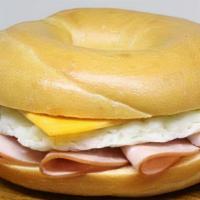 Ham, Egg, And Cheese Bagel · Ham, two scrambled eggs, and cheese on a bagel.