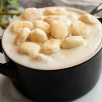 New England Clam Chowder · Served in a cup or bowl with a side of oyster crackers.